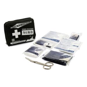 Trousse de premiers soins ( couverture isolante, pansements, bandages, sparadrap, gants et ciseaux